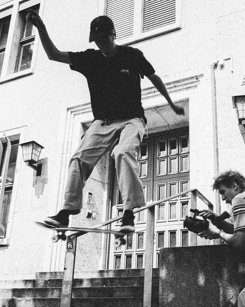 skater boardslide with a filmer